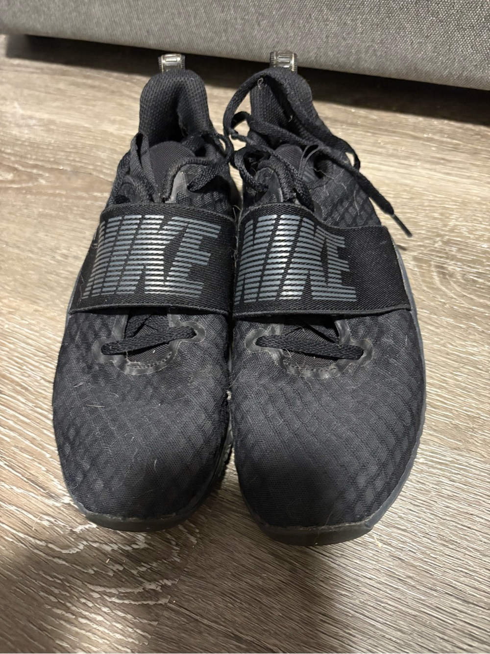 Nike Women's Black Slip-On Training Sneakers with Branded Strap